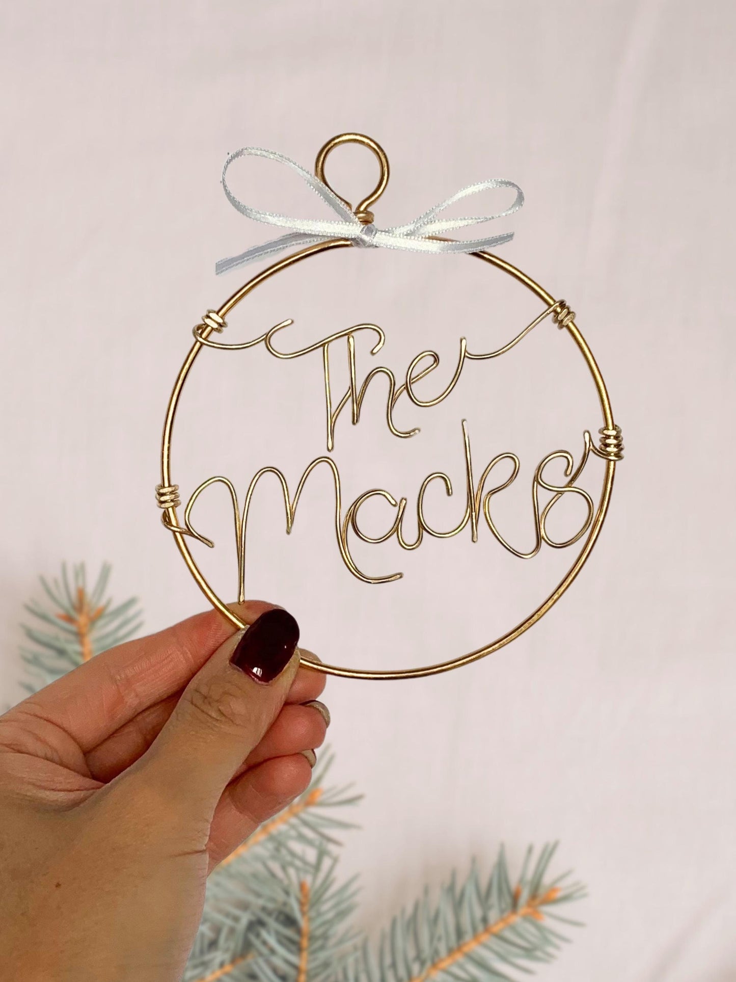wire christmas bauble, circle with personalised family name