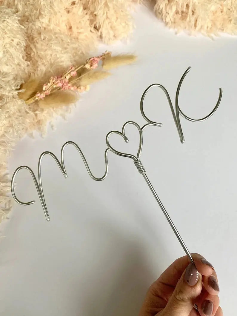 silver wedding cake topper, handmade wire with newlywedās initials and heart