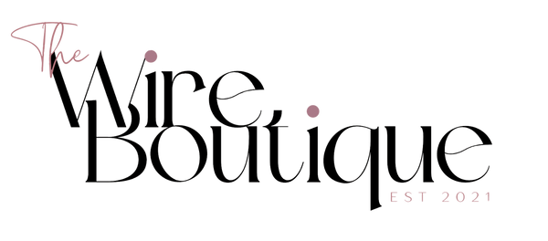 Logo of 'The Wire Boutique' with establishment year on a white background
