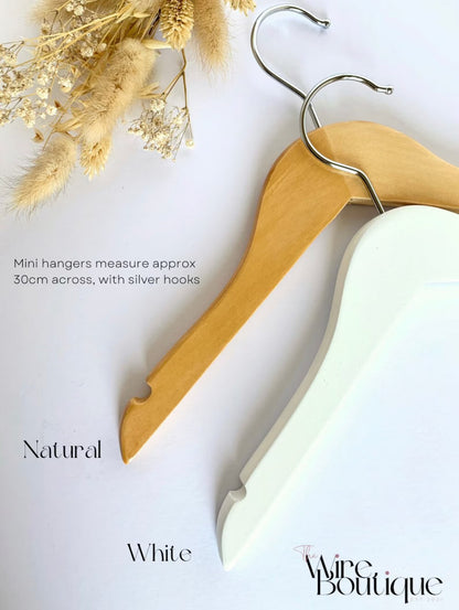 choice of colour for childs hanger - natural wood or white