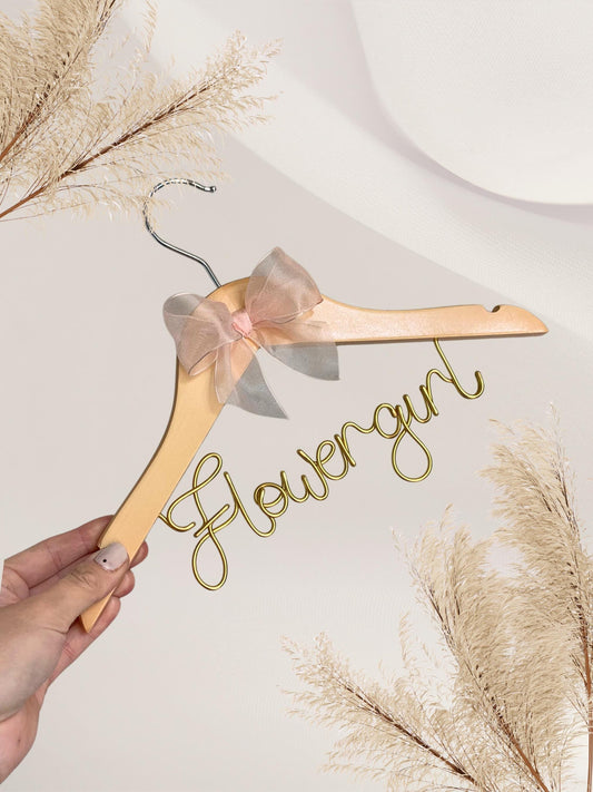 personalised flower girl dress hanger, pink bow, yellow gold wire name, natural wood hanger