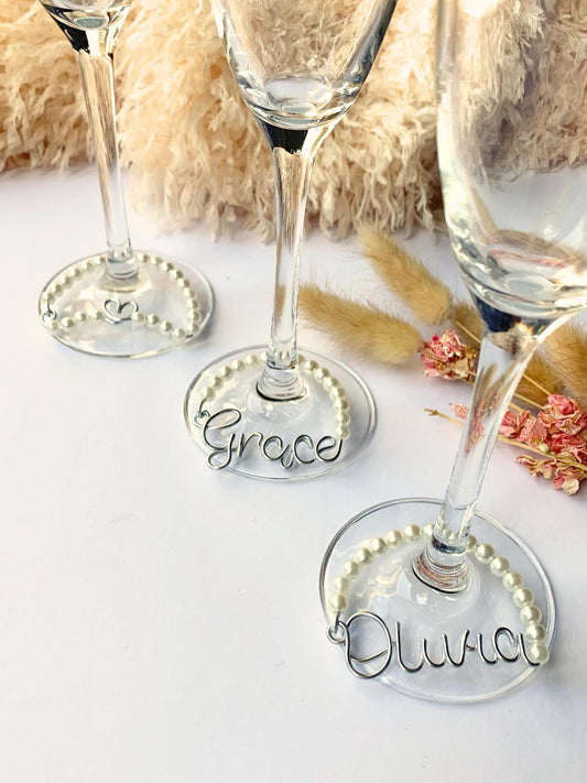 wine glass charms, handmade with personalised names  in silver wire, with pearl details