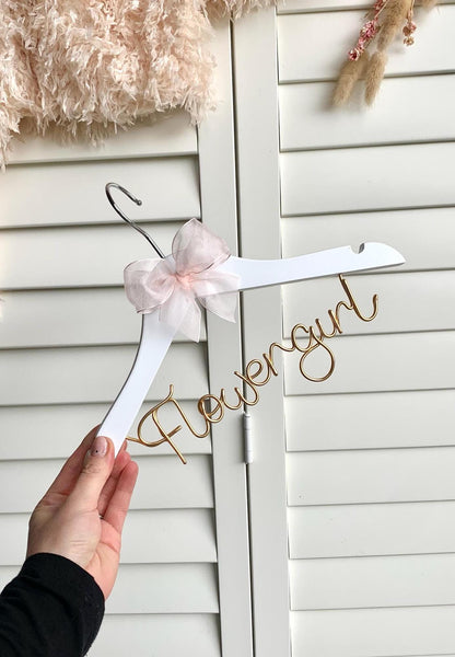 White flower girl hanger, with bronze gold lettering and light blush organza bow